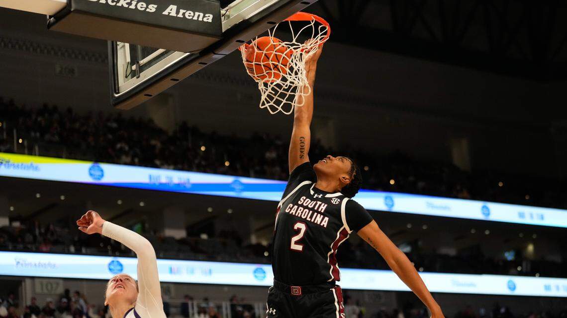 Dec 8, 2024; Fort Worth, Texas, USA; South Carolina Gamecocks forward Ashlyn Watkins (2) dunks the ball against TCU Horned Frogs center Sedona Prince (13) during the first half at Dickies Arena. Mandatory Credit: Chris Jones-Imagn Images