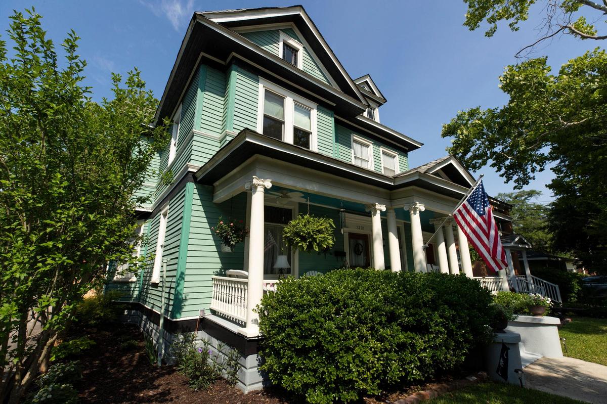 This Waverly neighborhood home was also a hair salon in the 1930s. Last summer the owners installed a creative greenhouse.