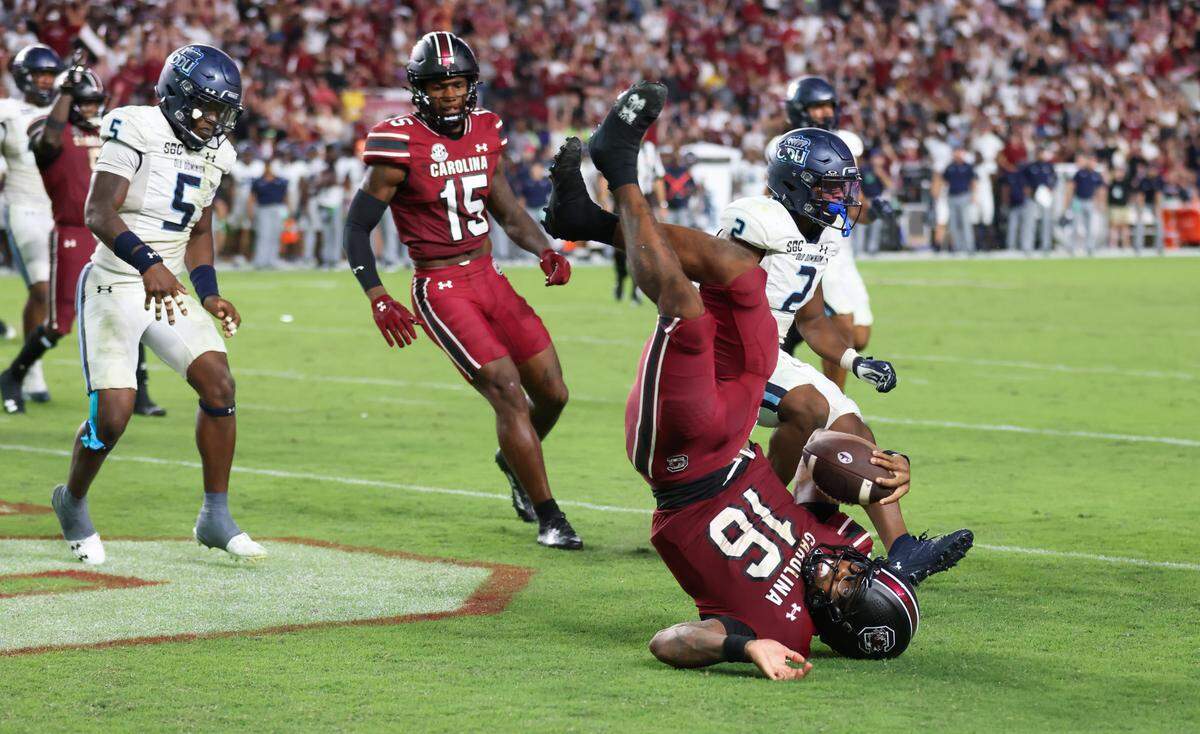 South Carolina quarterback LaNorris Sellers (16) rolls in the end zone after scoring a touchdown during the second half of the Gamecocks’ season opener against Old Dominion in Columbia on Saturday, August 31, 2024.