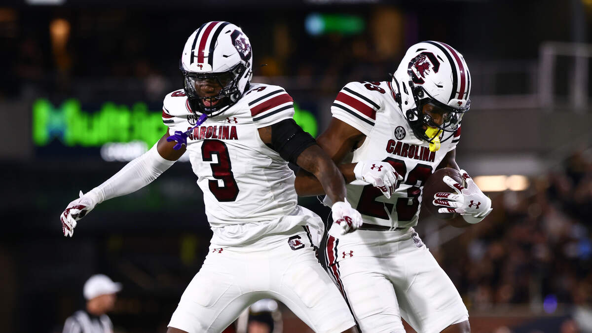 South Carolina defensive back Gerald Gilmore (23) and defensive back Myles Norwood (3) react to the interception during the Gamecocks’ game against Missouri at Memorial Stadium in Columbia, MO on Saturday, September 20, 2025.