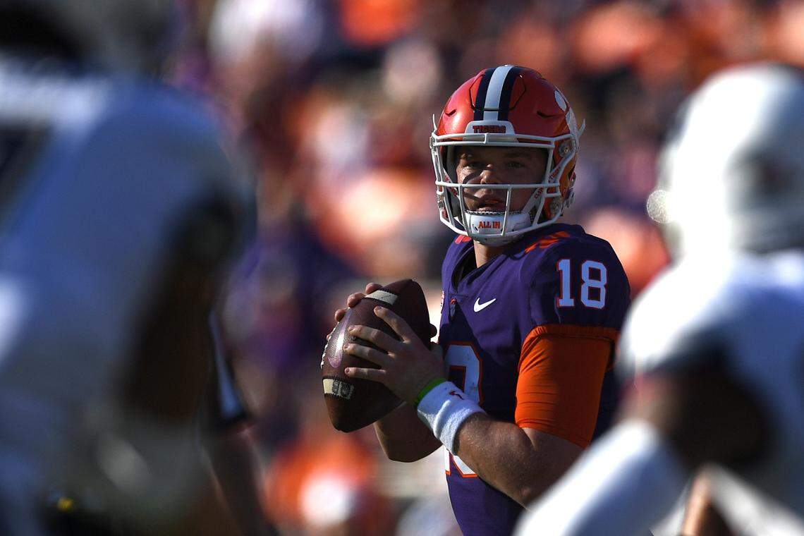 Nov 13, 2021; Clemson, South Carolina, USA; Clemson Tigers quarterback Hunter Helms (18) looks to throw against the Connecticut Huskies during the third quarter at Memorial Stadium.