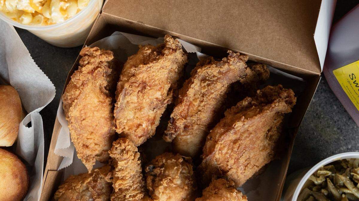 An image of fried chicken and several sides made for a family at Wade’s Restaurant in Spartanburg.