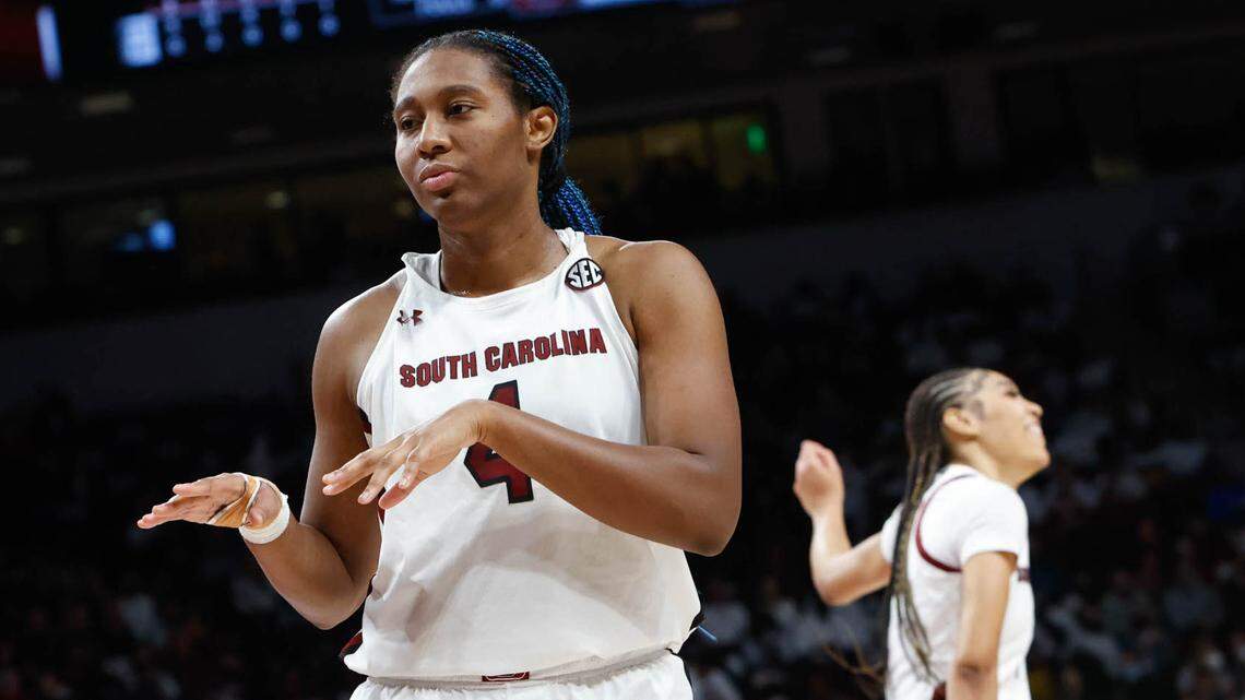 South Carolina’s Aliyah Boston (4) and South Carolina’s Victaria Saxton (5) dance to the music after a time-out during the second half of action against Ole Miss on Thursday, Jan. 27, 2022 in the Colonial Life Arena.