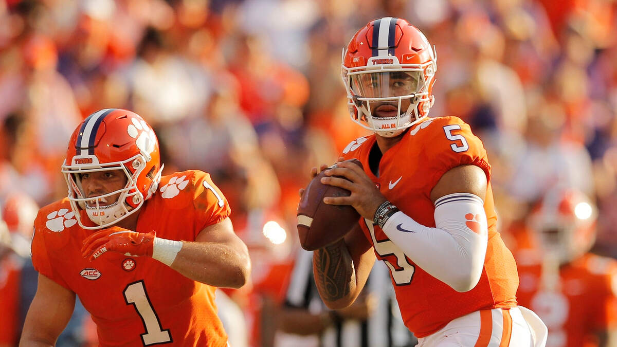 Clemson Tigers running back Will Shipley (1) fakes a handoff as quarterback D.J. Uiagalelei (5) looks to pass against S.C. State during second-quarter action in Clemson, S.C. on Saturday, Sept. 11, 2021.