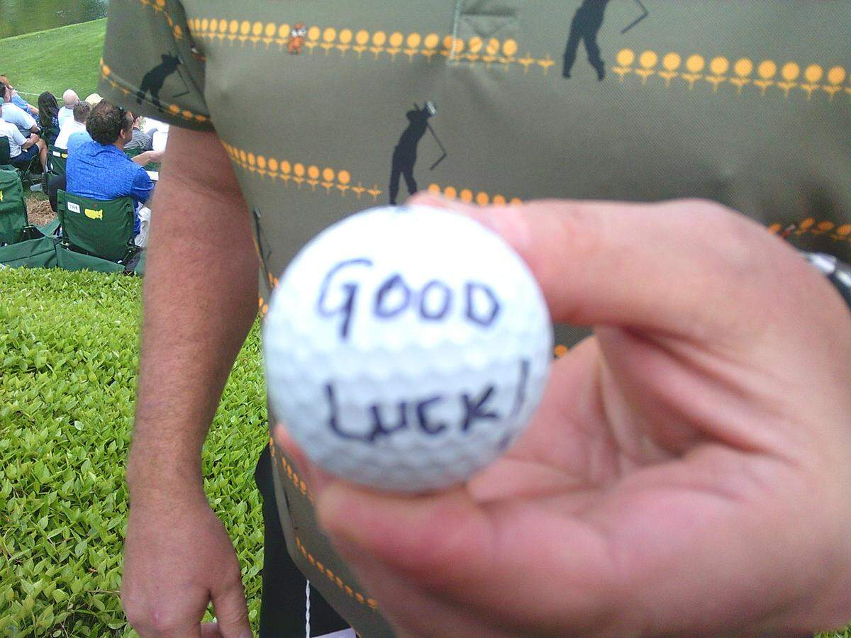 The ball Masters patron Brian Snyder holds up the ball he caught off the iron of Cameron Davis’ caddy.