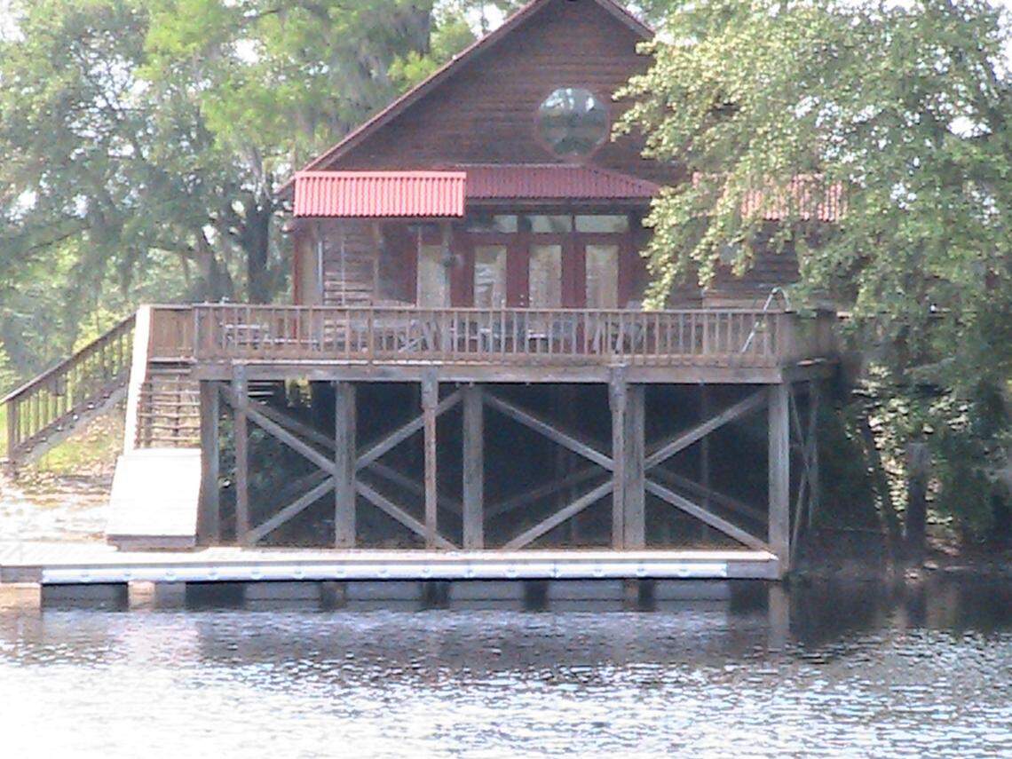 The Little Pee Dee River in South Carolina is characterized by black water and rural forested land. Some people have built homes on small stretches of the river, like this one in Horry County.
