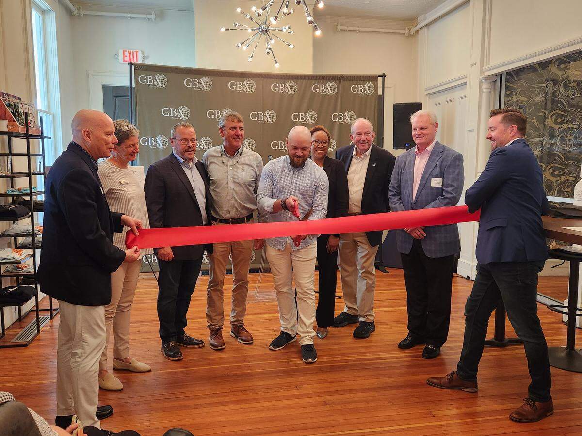 Restorations are complete on the historic Whaley House at 1527 Gervais St. in Columbia. The house, which formerly was a funeral home site, is now a coffee shop and apartments. Here, developers, elected officials, historic preservationists and entrepreneurs cut the ribbon.