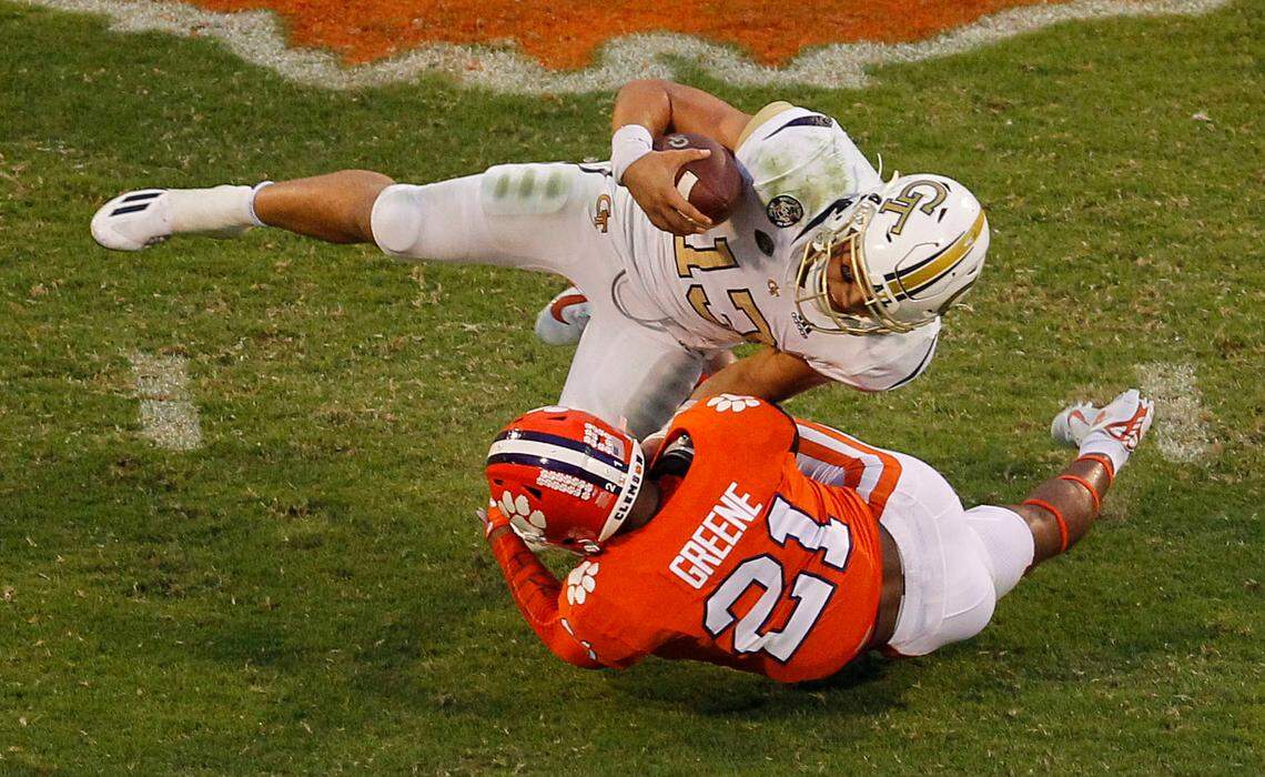 Clemson cornerback Malcolm Greene (21) pulls down Georgia Tech quarterback Jordan Yates (13) during third-quarter action in Clemson, S.C. on Saturday, Sept. 18, 2021.