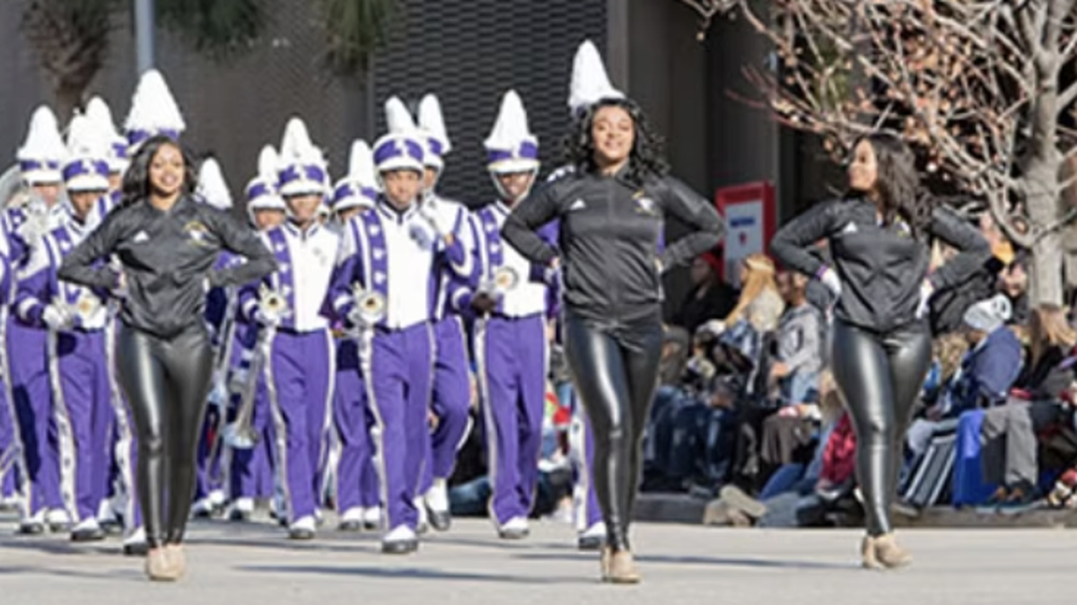 Band marches in 2024 Carillon Parade. This year there are 125 entries.