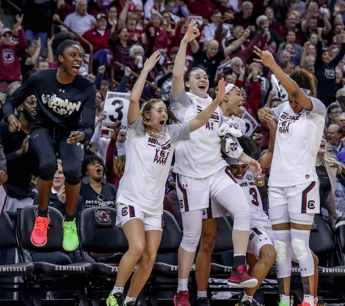 The University of South Carolina Gamecocks go wild during the second half of action against the University of Connecticut in the Colonial Life Arena. USC beat the once dominant Huskies, 70-52.