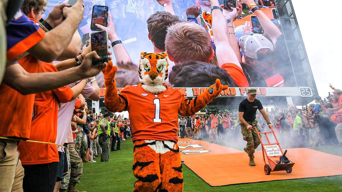 Clemson Tigers mascot Tiger runs down the hill before a game. The mascot visited Myrtle Beach, SC Aug. 10, 2024, greeting local residents at the Sky Zone.
