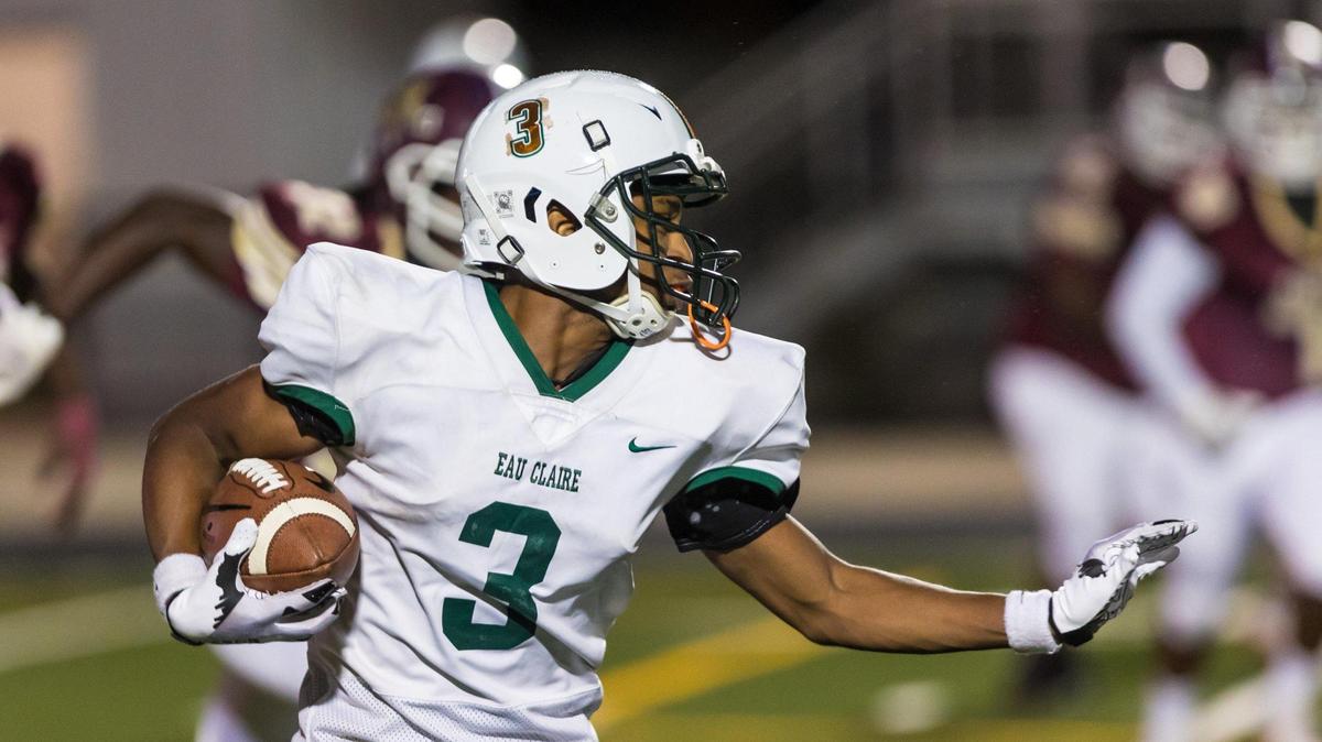 Eau Claire Shamrocks Ny’zaire Wilson rushes against the Columbia Capitals.