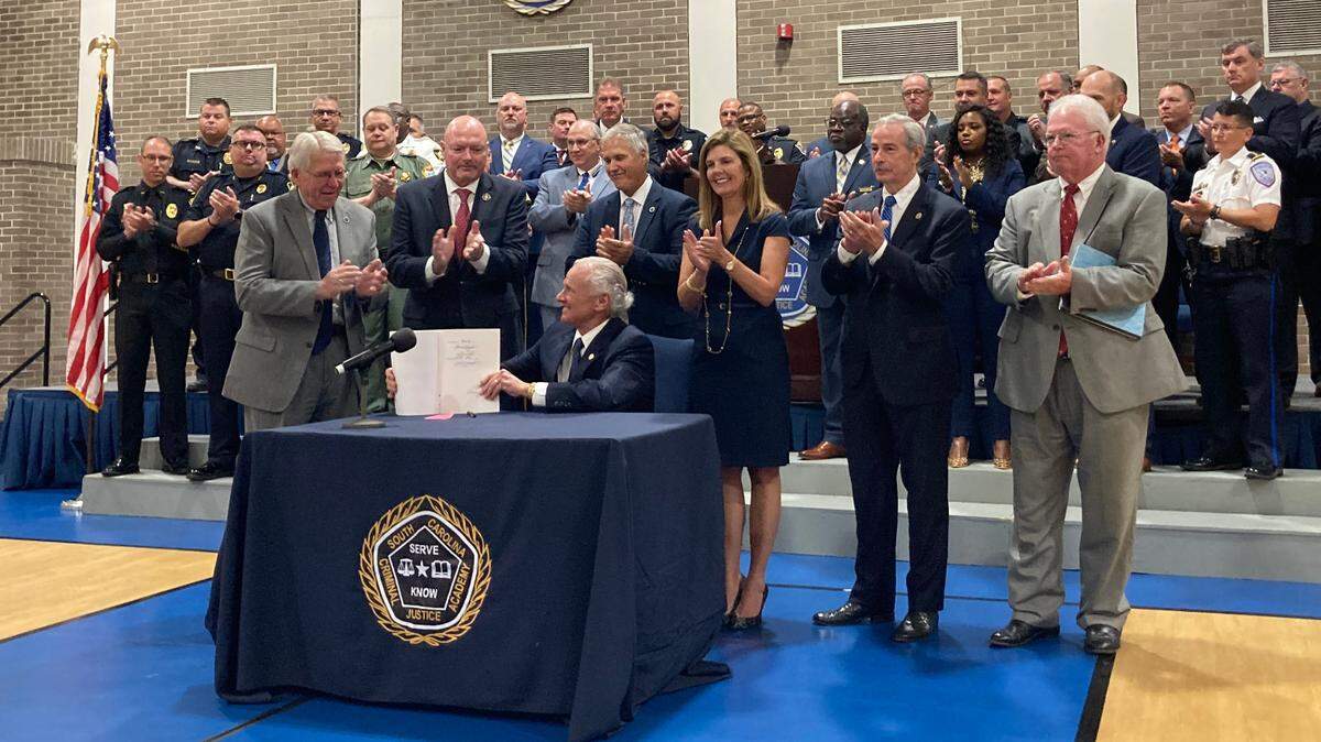 Governor Henry McMaster ceremonially signed the new law at the South Carolina Criminal Justice Academy, where all new law enforcement officers are required to receive training.