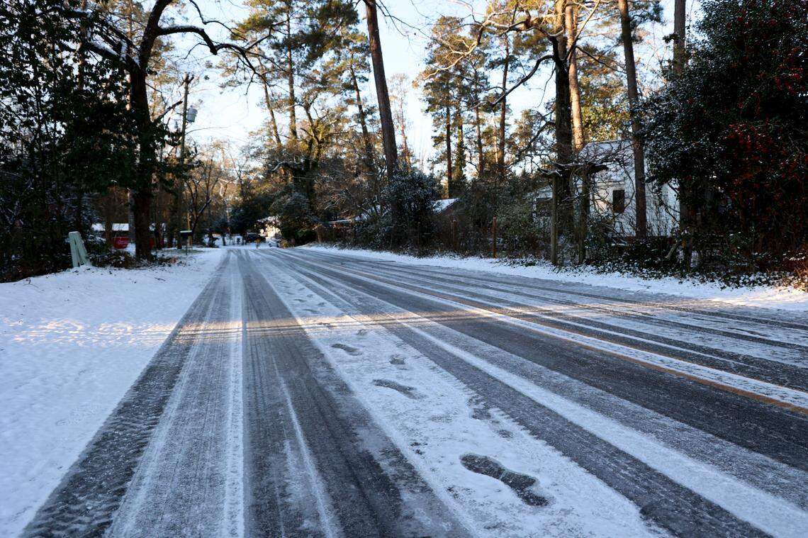 Ice covers Deerwood Street as snow blankets Columbia on Wednesday, Jan. 22, 2025.