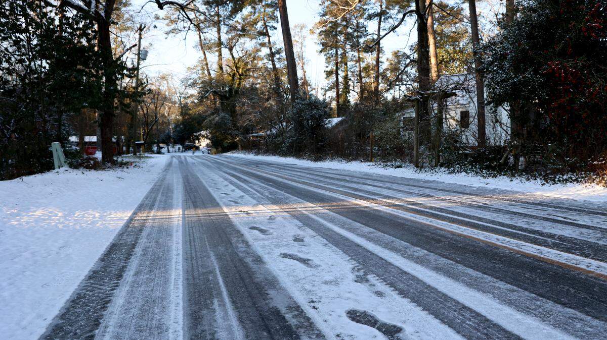 Ice covers Deerwood Street as snow blankets Columbia on Wednesday, Jan. 22, 2025.