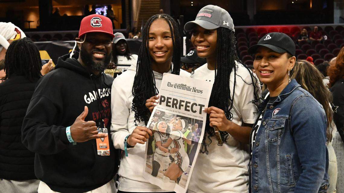From left, father Bryan Hall, younger sister Brooklyn Hall, older sister Bree Hall and mother LaShauna Hall pose for a photo after South Carolina’s 2024 national championship game win over Iowa at Cleveland’s Rocket Mortgage FieldHouse.