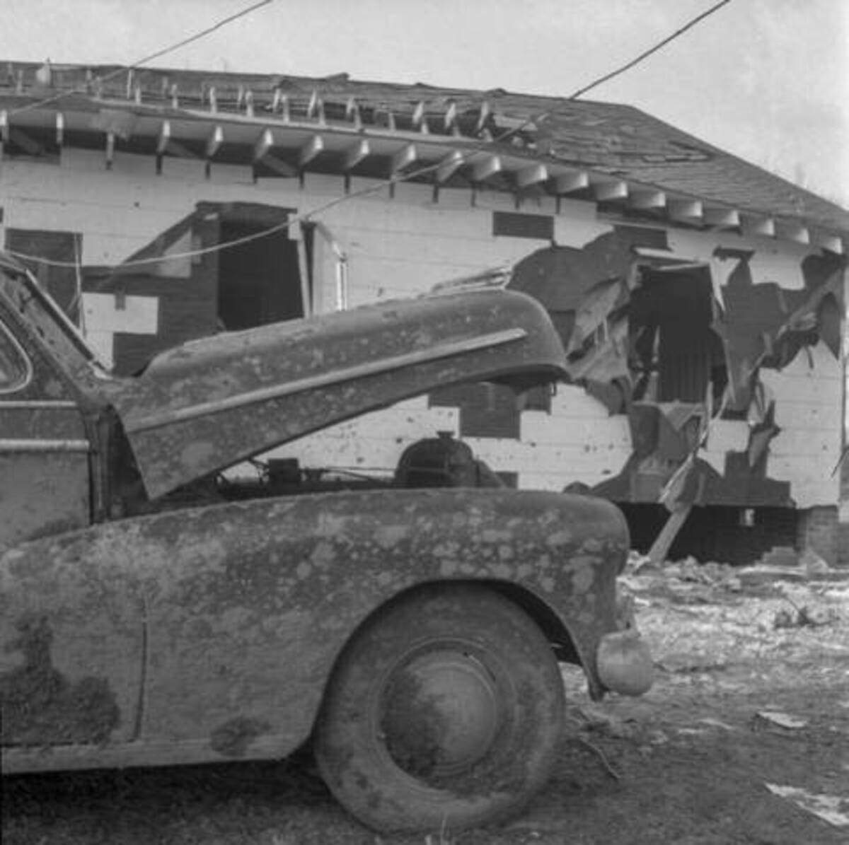 The damage to the Gregg family home after a nuclear bomb was accidentally dropped on their property.