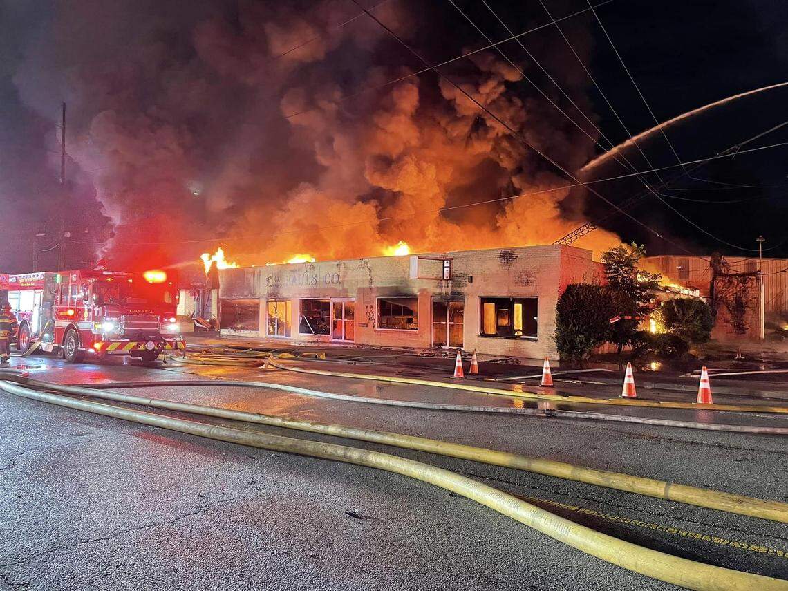 Members of the Columbia Fire Department battle a blaze.