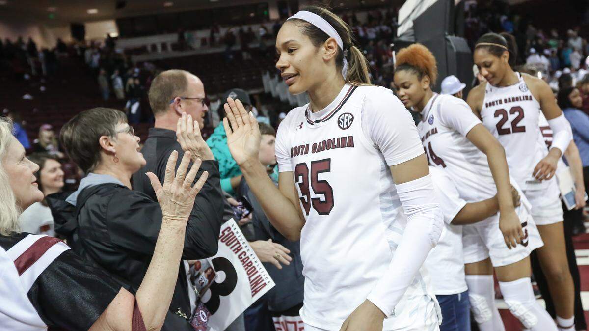 South Carolina's Alexis Jennings (35) greets fans after the Gamecocks beat Missouri in the Colonial Life Arena. 1/28/18