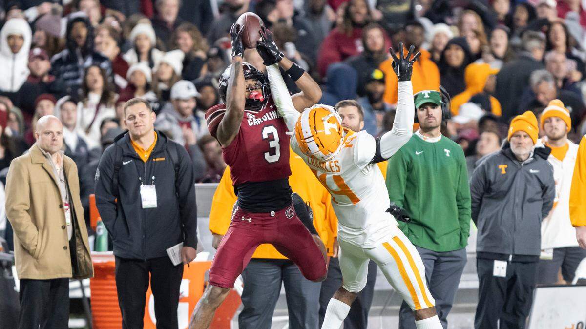 South Carolina Gamecocks wide receiver Antwane Wells Jr. (3) pulls down a pass over the head of Tennessee Volunteers defensive back Christian Charles (14) at Williams-Brice Stadium in Columbia, SC on Saturday, Nov. 19, 2022.