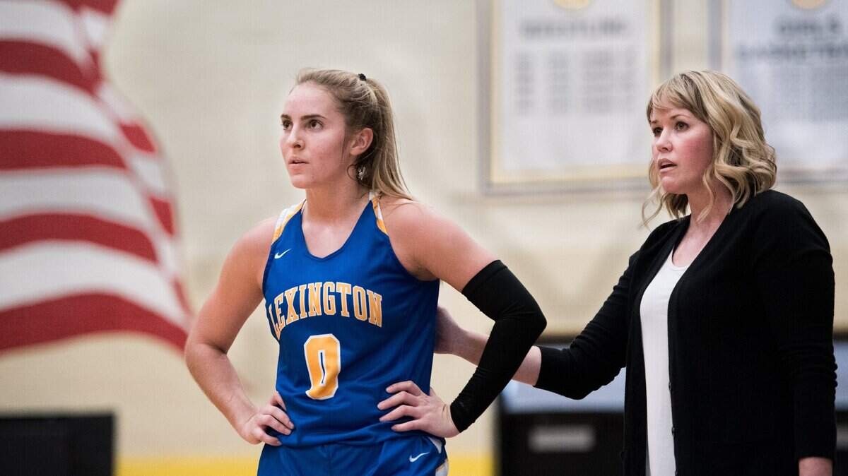 Lexington head coach Molly Goodric, right, talks with senior guard Olivia Thompson during a game earlier this season. Thompson scored 24 points in helping the Wildcats to a 67-50 over James Island in Class 5A Lower State playoffs on Monday, Feb. 18, 2019.