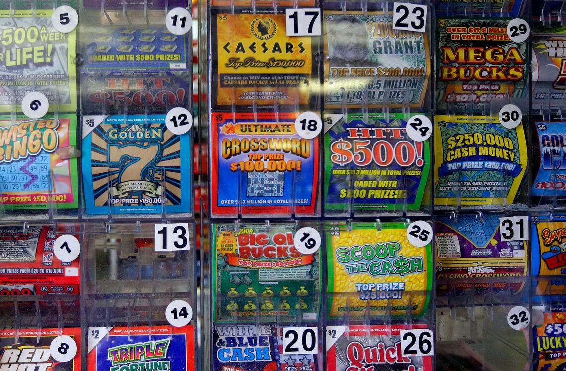 In this Thursday, July 17, 2014 photo, scratch-off lottery tickets for sale are on display at Eagles Express in Knightdale, N.C. North Carolinas lottery has steadily grown over its first decade and its leaders say it has room to grow even more in the coming years. (AP Photo/Gerry Broome)