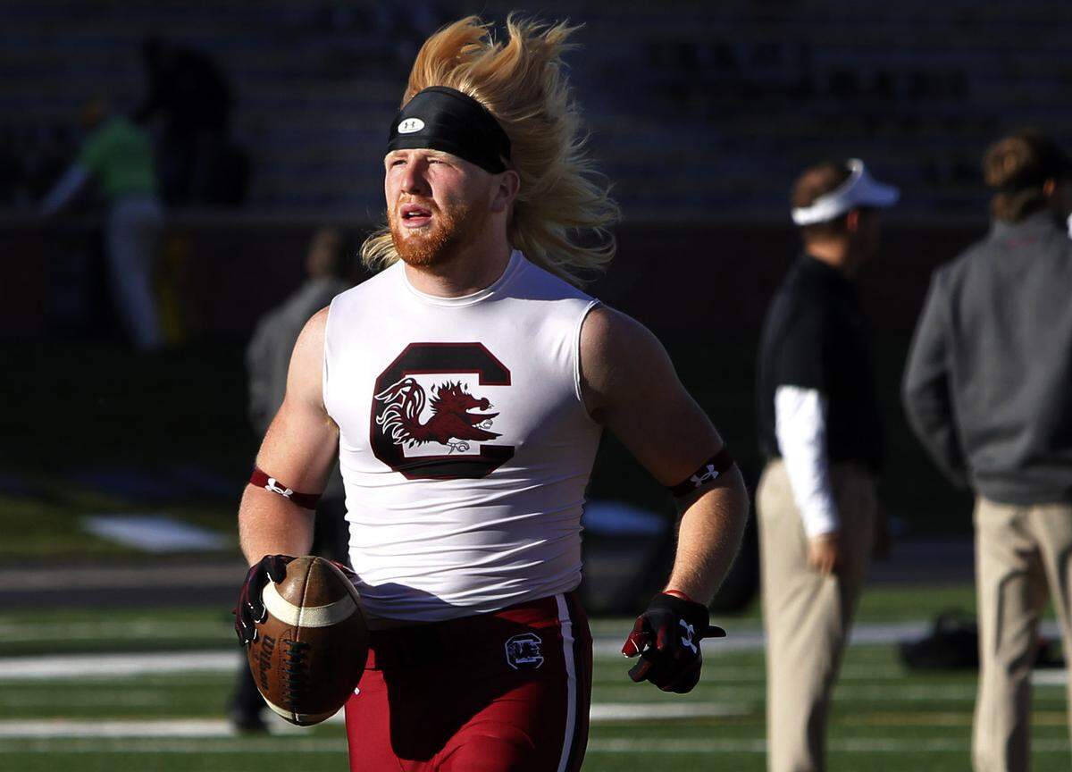 South Carolina’s Patrick Fish warms up prior to the Gamecocks’ 2013 game at Missouri.