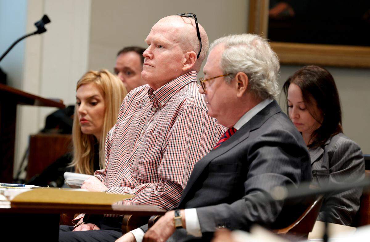 Alex Murdaugh sits with his attorney Dick Harpootlian during a judicial hearing before Judge Clifton Newman in the Colleton County Courthouse on Monday, Aug. 29, 2022.