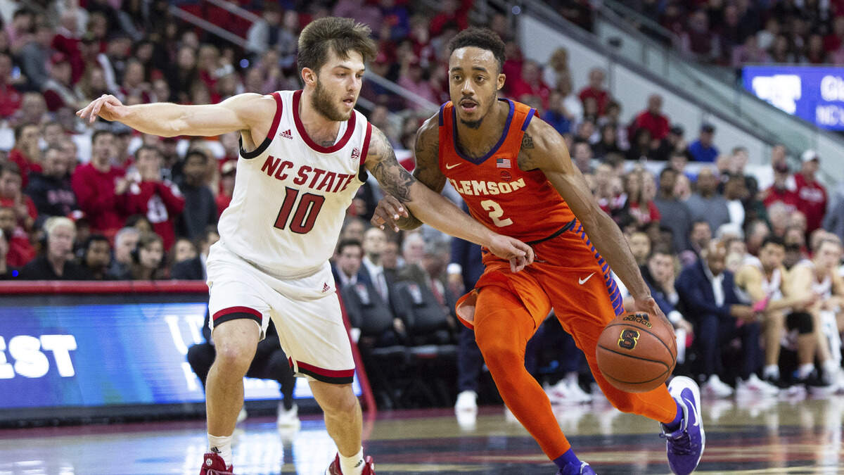 Clemson’s Marcquise Reed (2) drives against North Carolina State’s Braxton Beverly (10) during the second half of an NCAA college basketball game in Raleigh, N.C., Saturday, Jan. 26, 2019. (AP Photo/Ben McKeown)
