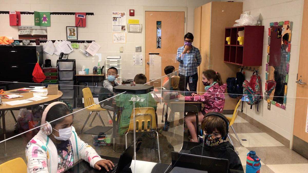Greenville County Schools facilities workers designed Plexiglass shields that enable students to sit closer than the recommended six feet to avoid COVID-19 exposure.
