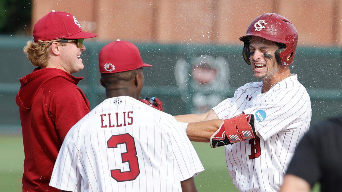South Carolina’s Will Tippett (13) celebrates his game winning sacrifice fly during an NCAA college regional baseball game against James Madison in Raleigh, N.C., Friday, May 31, 2024.