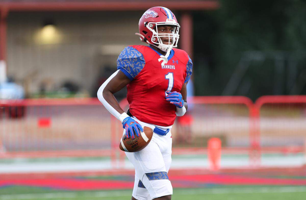 Michael Tyler (1) of Hammond warms up during Hammond’s game against visiting Grey Collegiate on Friday, September 1, 2023.