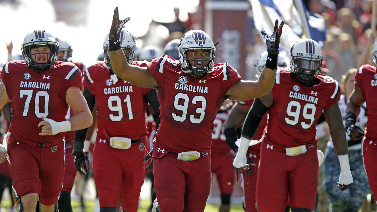 Ulric Jones (93) leads the Gamecocks out to 2001