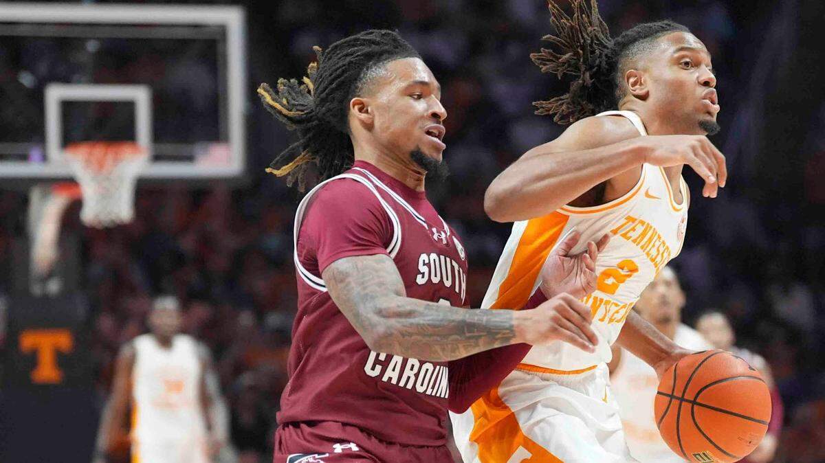 South Carolina’s Jamarii Thomas and Tennessee’s Chaz Lanier (2) battle for possession during a men’s college basketball game at Thompson-Boling Arena at Food City Center, Saturday, March 8, 2025.