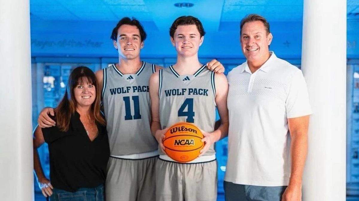 Now-Clemson basketball players Nick Davidson (middle left) and Blake Davidson (middle right) with their mother Kelly (left) and their father Kirk (right)