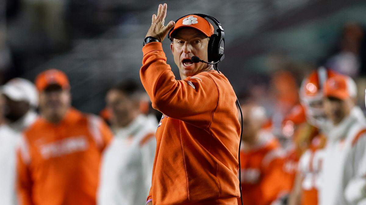 Oct 8, 2022; Chestnut Hill, Massachusetts, USA; Clemson Tigers head coach Dabo Swinney calls plays during the second half against the Boston College Eagles at Alumni Stadium.