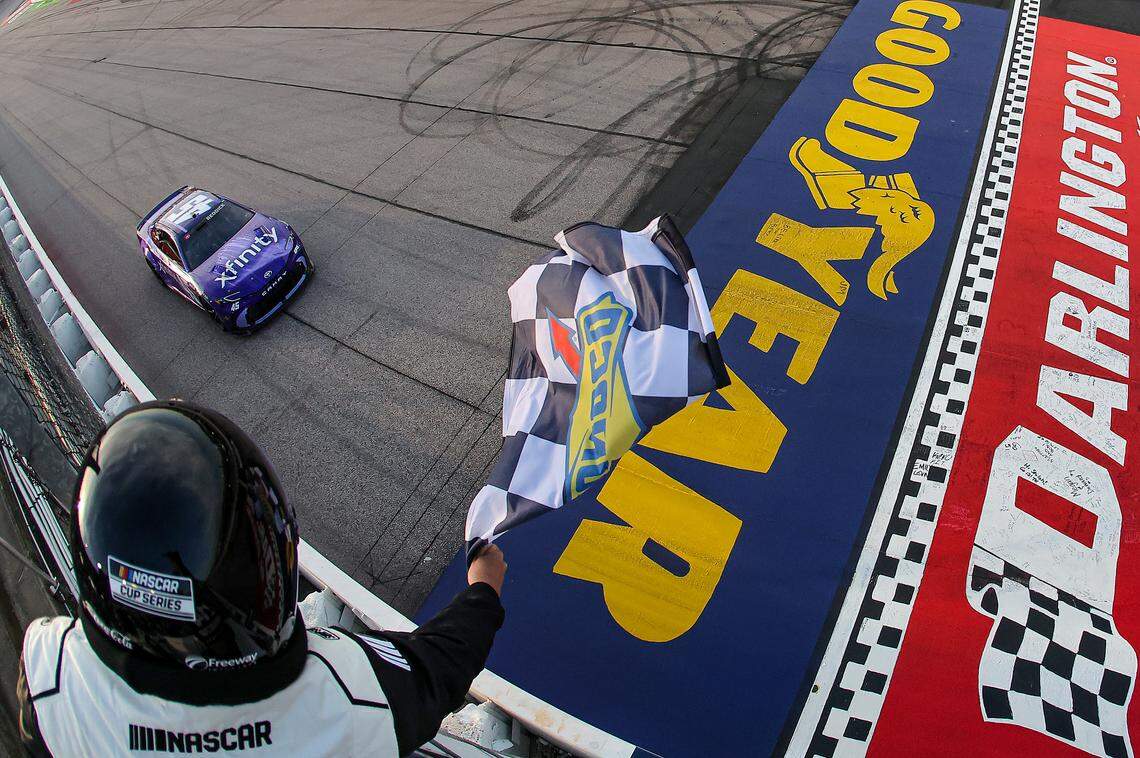 Tyler Reddick, driver of the No. 45 Xfinity Toyota, takes the checkered flag to win the NASCAR Cup Series Goodyear 400 at Darlington Raceway on March 22, 2026 in Darlington, South Carolina.
