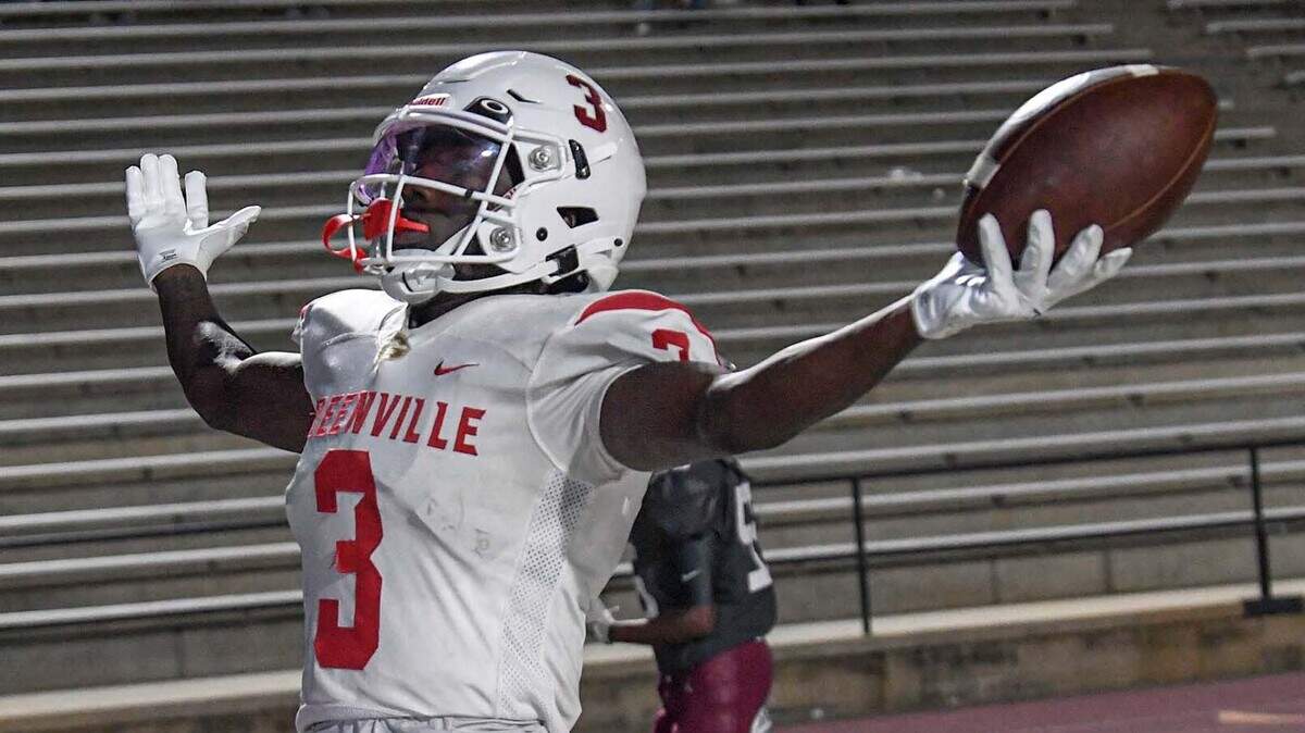 Greenville’s Mazeo scores near Westside High linebacker Zomarion Sullivan (55) during the fourth quarter at Westside High in Anderson, S.C. on Oct. 3, 2022.