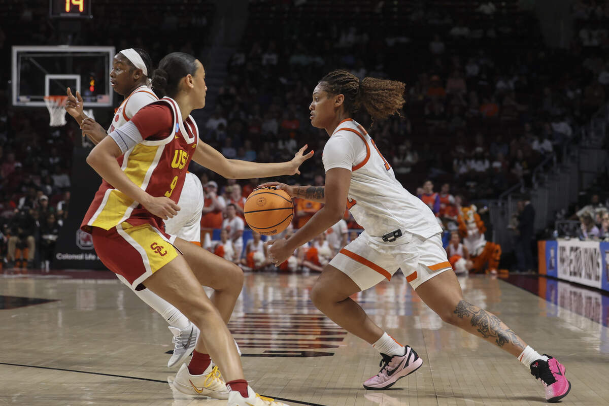 Clemson’s Taylor Johnson-Matthews (10) drives the ball as University of Southern California’s Jazzy Davidson (9) pressures during the first half of action of their women's basketball game against University of Southern California in the first round game of the NCAA Tournament at Colonial Life Arena on Saturday, March 21, 2026.