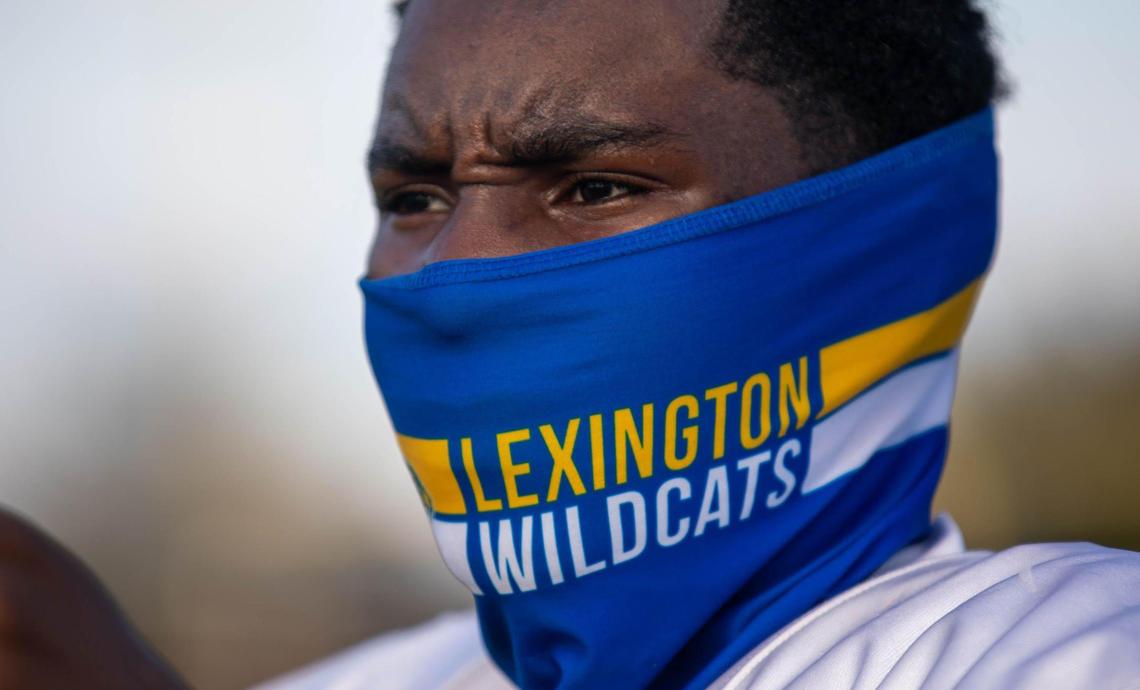 Lexington High football player Eric Mitchell wears a mask during practice at Lexington High School to help prevent the spread of the coronavirus.
