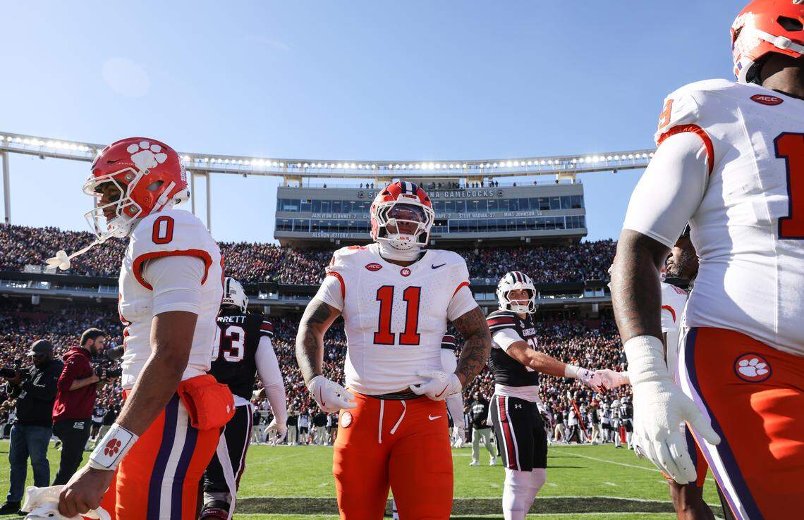 Clemson defensive tackle Peter Woods, middle, is seen following the coin toss before South Carolina’s game against Clemson at Williams-Brice Stadium in Columbia on Nov. 29, 2025.
