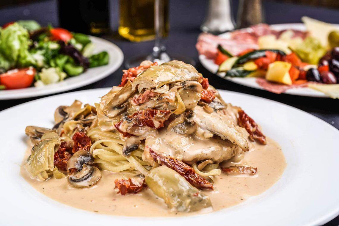 Topped with mushrooms, artichoke hearts and sun-dried tomatoes, sautéed in a sherry wine and cream sauce and served over linguine, Villa Tronco chicken is Villa Tronco’s most popular dish.