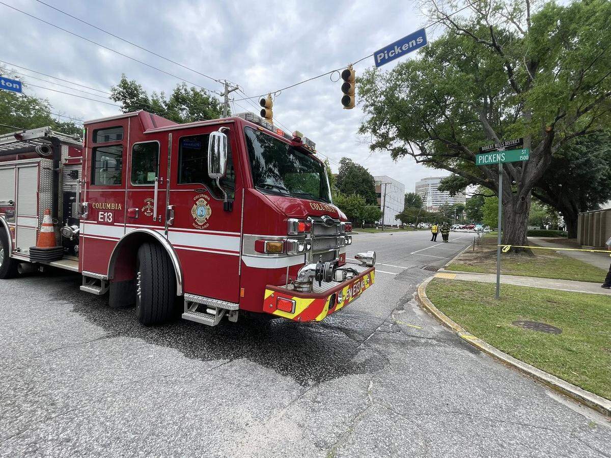 Members of the Columbia Fire Department respond to a collision that closed busy roads.