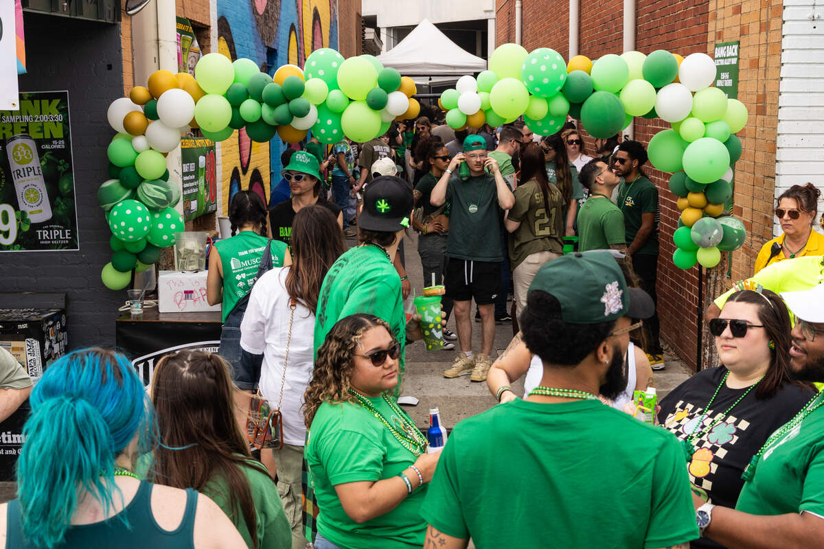 DJs spin tracks in the alley on Saluda Avenue during the St. Pat’s in Five Points festival in Columbia, South Carolina on Saturday, March 15, 2025.