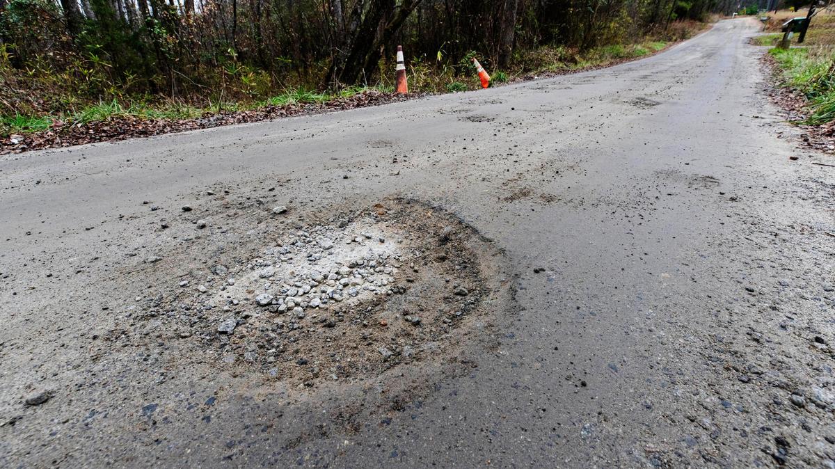 A pot hole on Elton Walker Road just past a bridge resident Berry Marcus says might be unsafe.