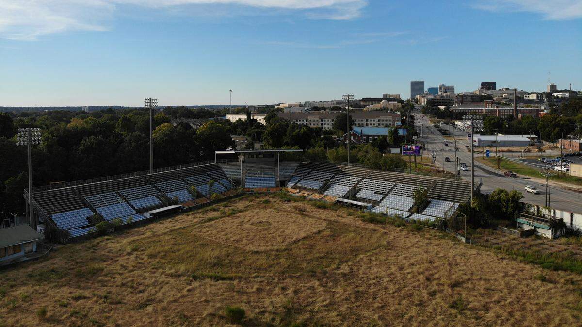 Capital City Stadium is overgrown and unused in Columbia, South Carolina on Tuesday, Sept. 28, 2022. The city and developers have tried to tear down the old baseball stadium for years. 