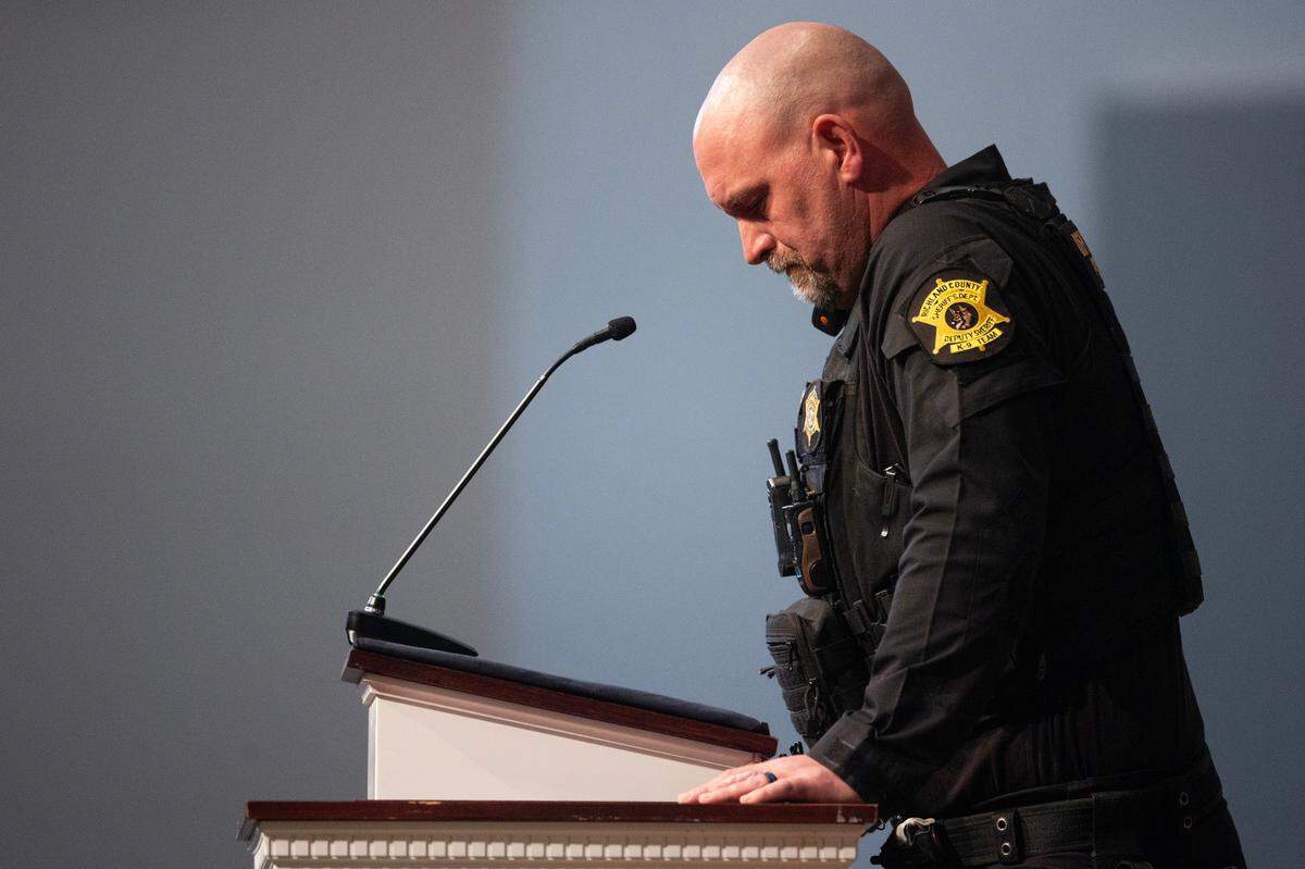 Richland County Sheriffs Department K9 Specialist Alan Ware speaks during the funeral for his K9 partner Bumi, who died while pursuing a teenage suspect on December 23, 2024. A 13-year-old has been charged in the dog’s death.