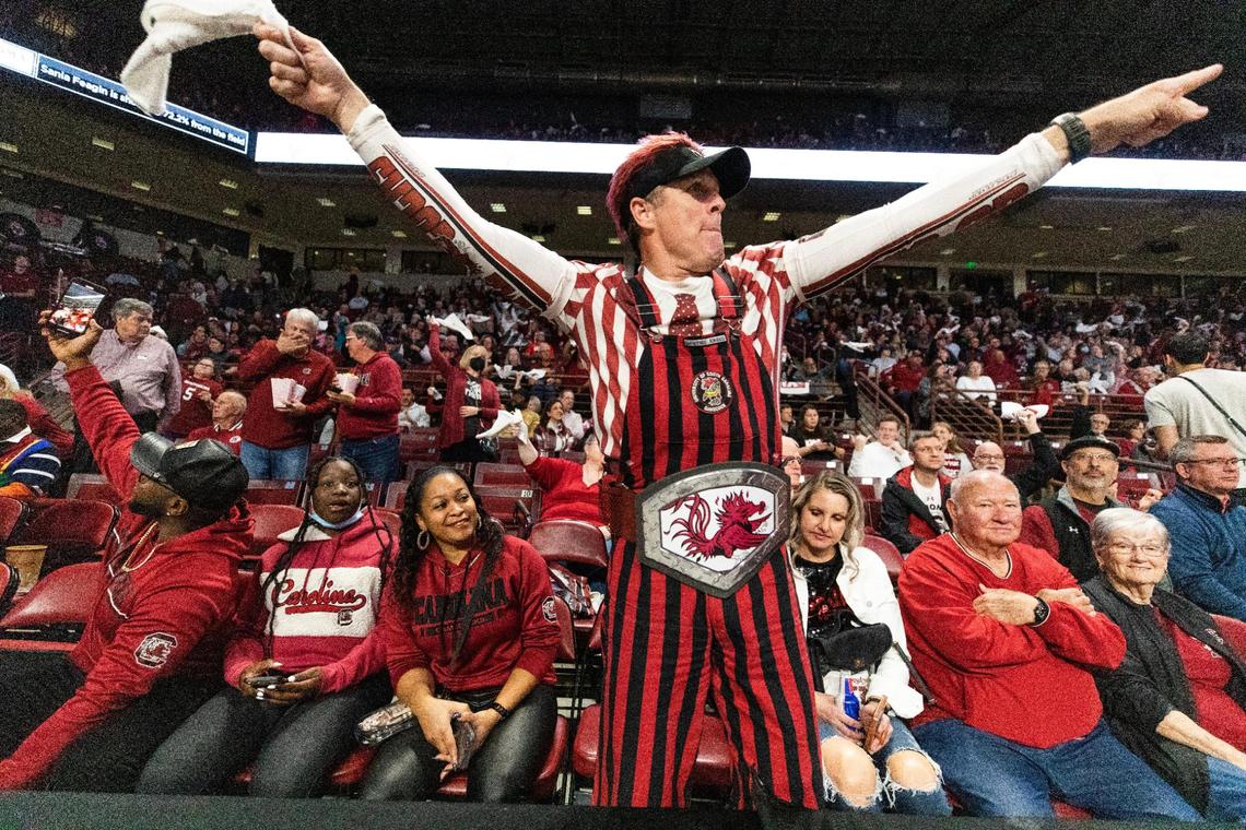 John Lane swings a towel and cheers on South Carolina’s women’s basketball team plays UCLA on Tuesday, November 29, 2022.