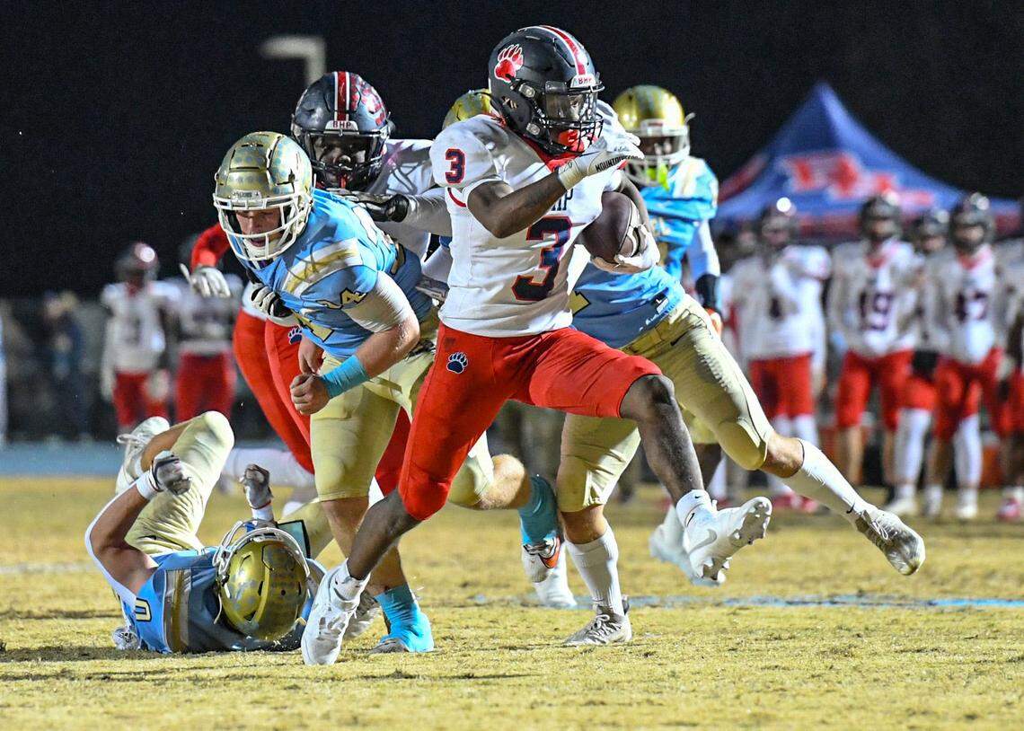 Belton-Honea Path junior Marquise Henderson (3) runs by DW Daniel players for a touchdown during the second quarter of the Class 3A State Championship semifinal in Central, S.C. Friday, November 24, 2023.
