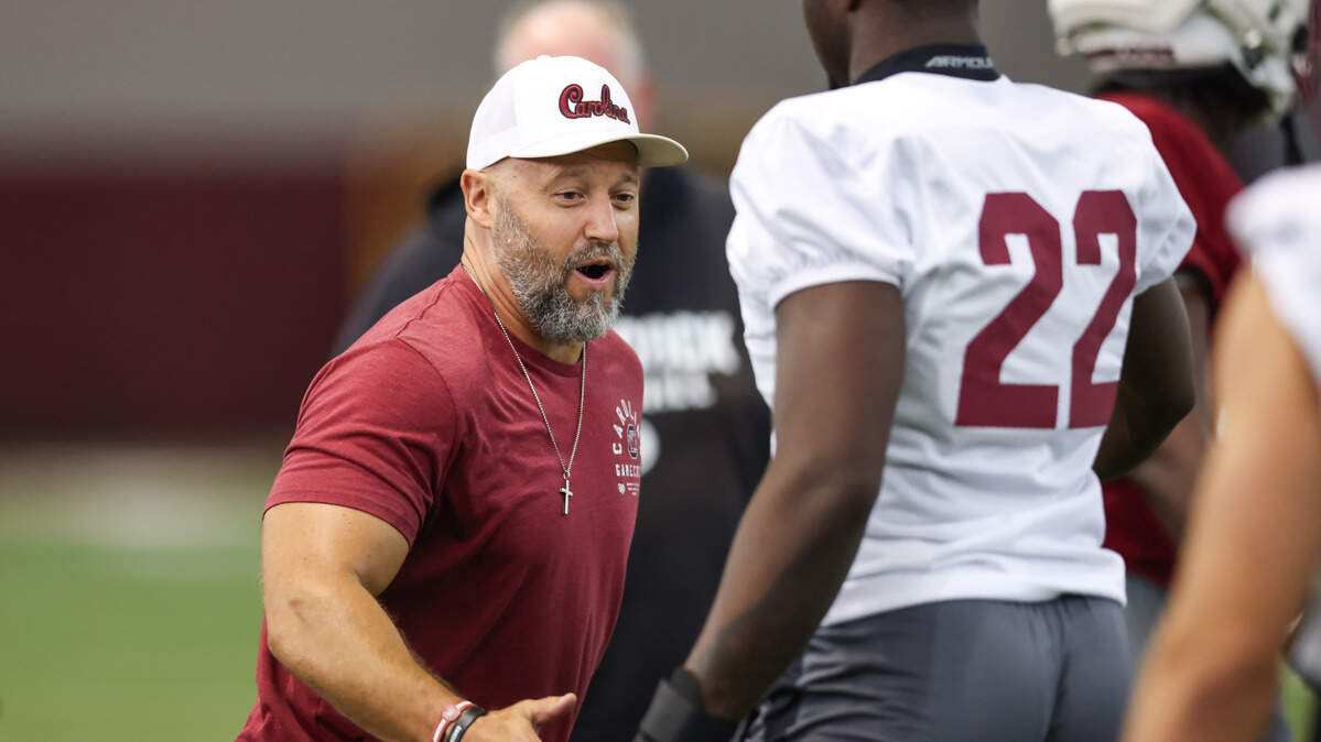South Carolina wide receivers coach Mike Furrey speaks with players during practice in Columbia on Friday, August 1, 2025.
